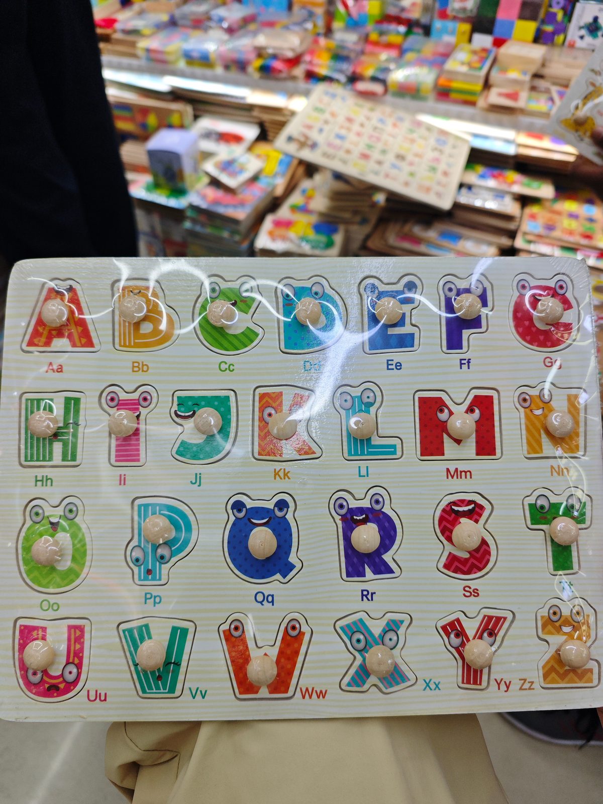 Alphabet matching board with pegs